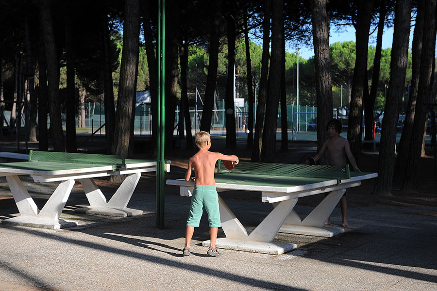 Child playing ping pong